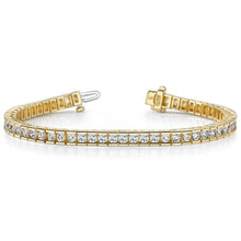 Load image into Gallery viewer, Diamond Tennis Bracelet Round Channel In Yellow Gold (2.50 Ctw)
